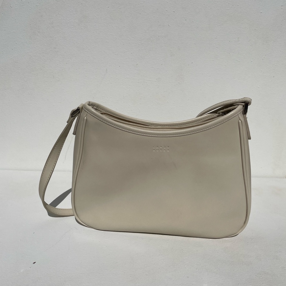 Crazy Horse Liz Claiborne cream handbag